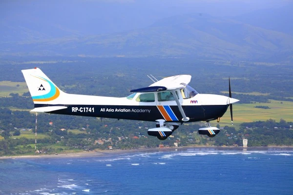 AAA Cessna 172P in flight during pilot training operations