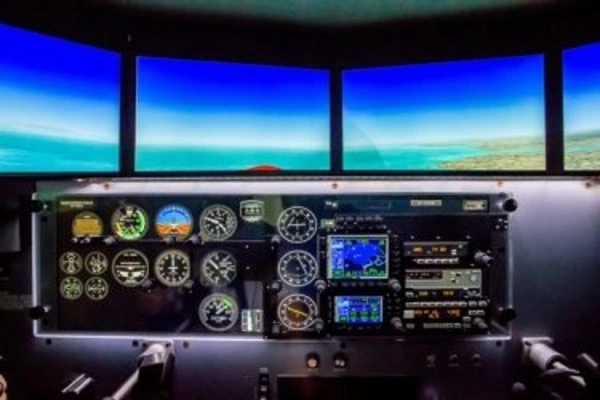 Cockpit view of AAA's Redbird MCX flight simulator
