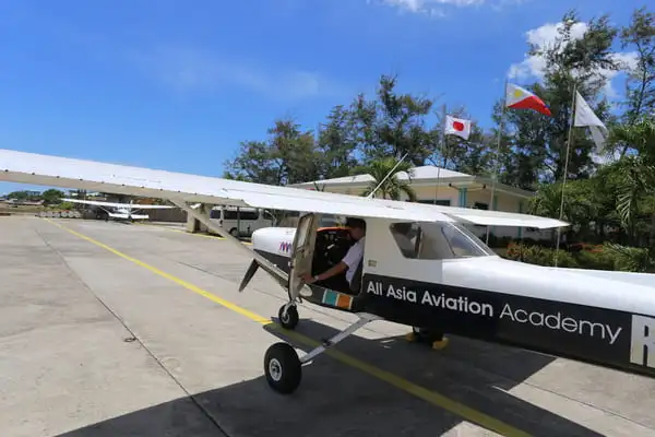 AAA Cessna 152 parked at the training campus before a student training flight